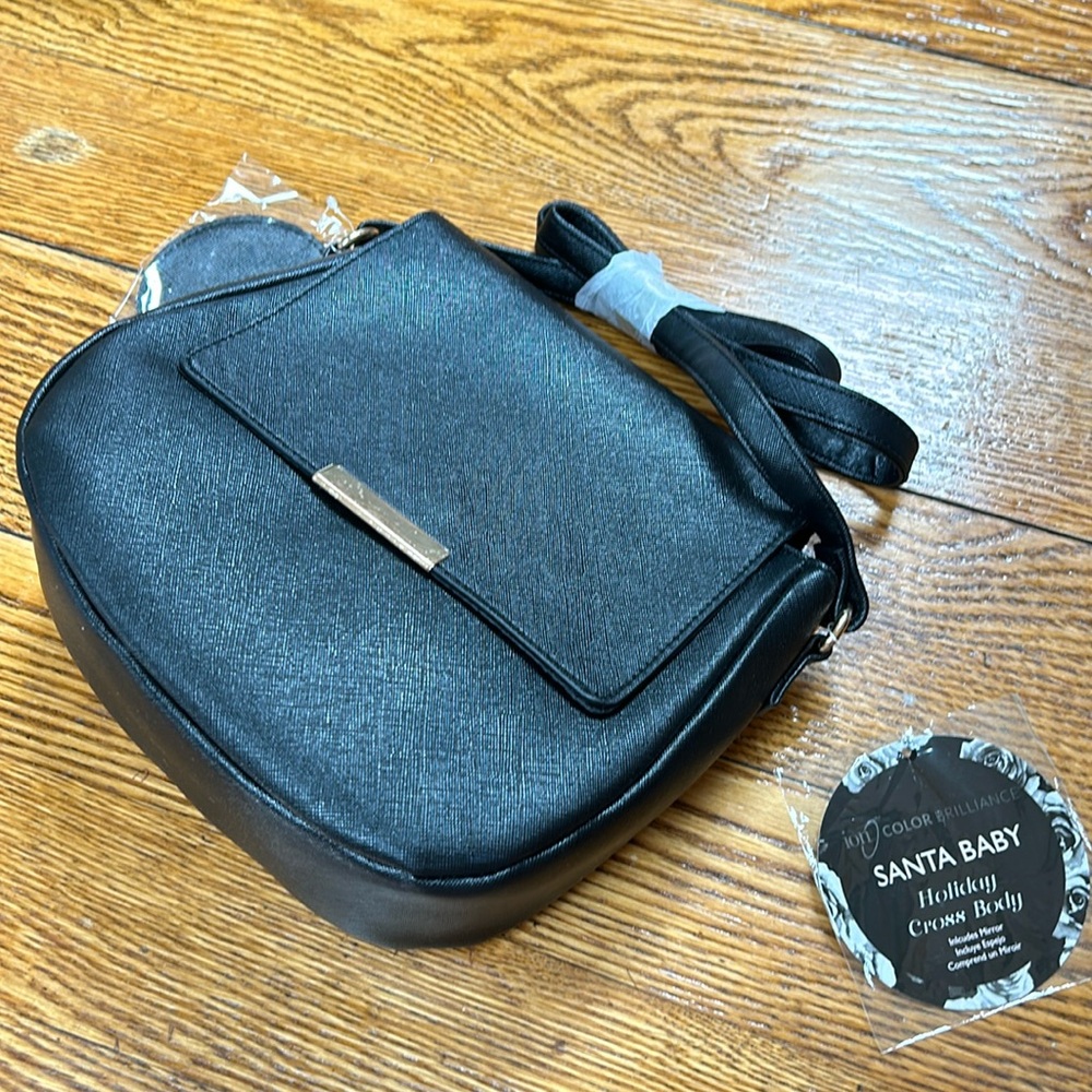 Ion color brilliance black shoulder bag. New with tags. Mirror included.